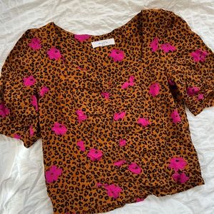 Small Elodie top in burnt orange cheetah print with dark fuchsia flowers